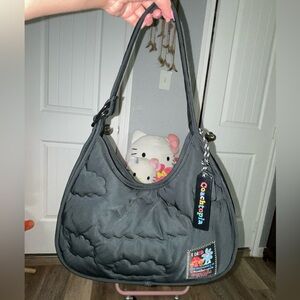 Coachtopia quilted ergo bag